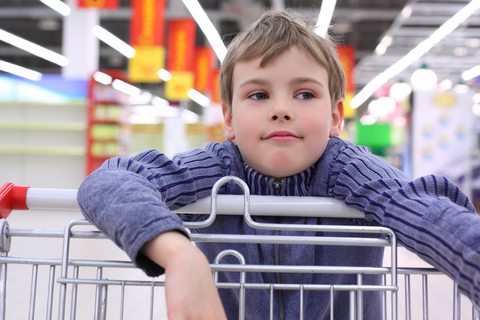 Boy with shopping cart